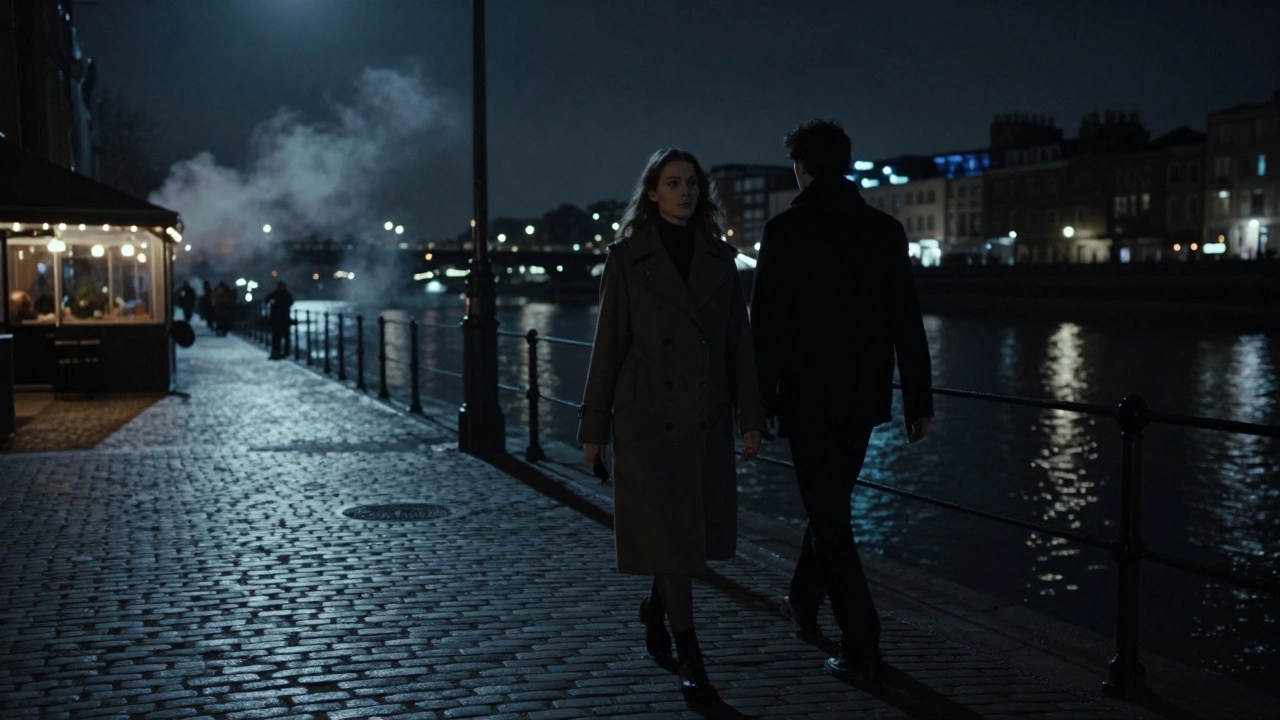 A couple walks silently along the Thames at night under moonlight, shadows and reflections blending.